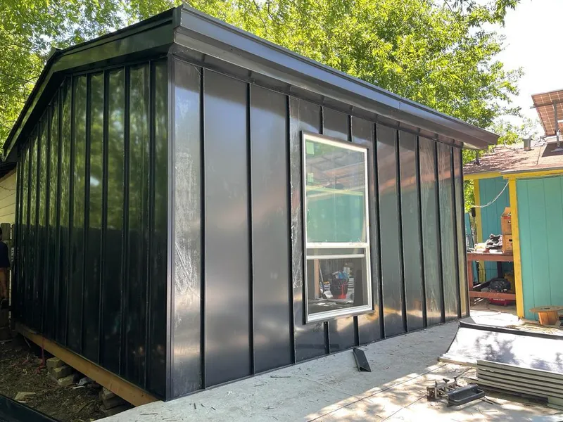 Black standing seam metal wall panels for Metal Roof Installation in Estes Park